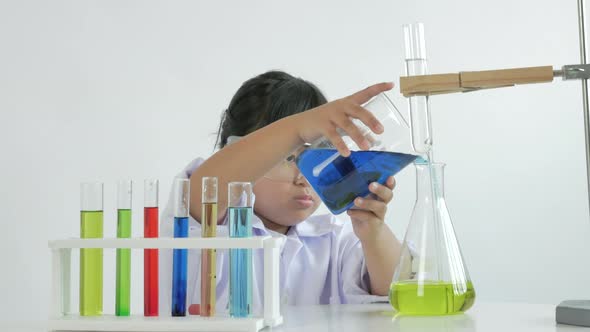 Children play and learn chemical in laboratory