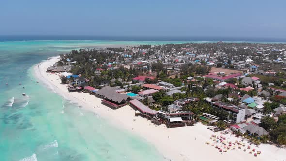 Aerial Paradise Sandy Beach with Turquoise Ocean and Luxury Hotels in Zanzibar alt