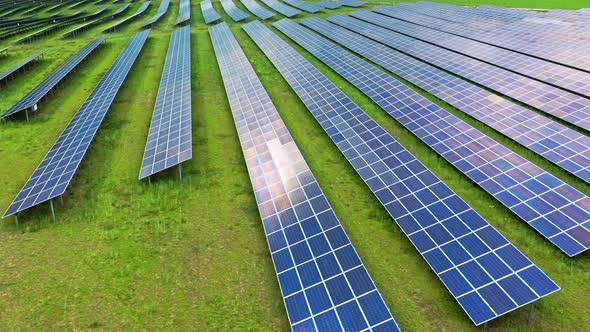 Big and blue photovoltaic farm as a renewable energy source. alt