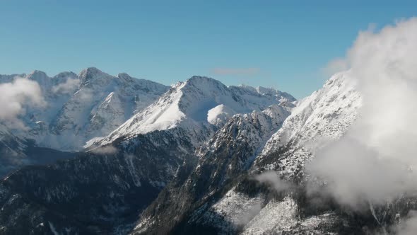Scenic Aerial View of High Mountains Peaks Range