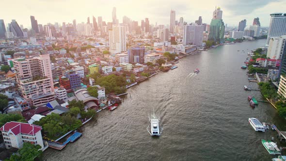 4K UHD : Bangkok River drone view. Flying over the Chao Phraya River alt