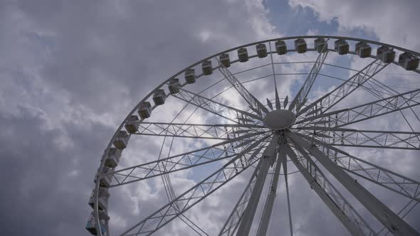 Time lapse of ferris wheel rotating alt