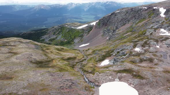 Beautiful valleys and mountains by Crater Lake in British Columbia, Canada. Wide angle aerial shot alt