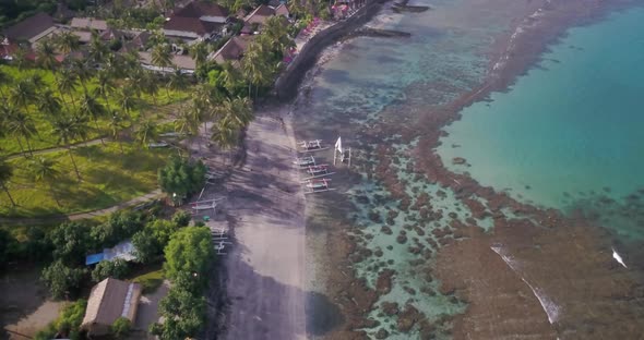 A Drone Shot of Ocean Lagoon and Beach Coast on Tropical Island alt