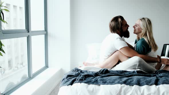 Couple Kissing On Bed In Bedroom 4k Stock Footage Videohive