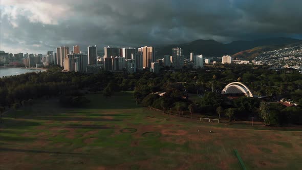 Aerial drone footage of Honolulu, Hawaii. Beautiful real estate, buildings in the city. Palm trees alt