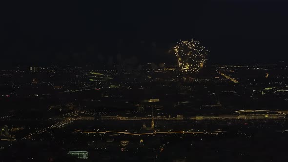 Big Bright Fireworks Over Night Cityscape with Reflection in the Rivers