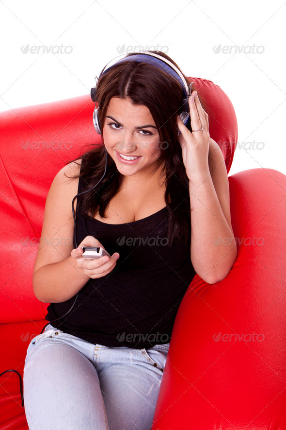 Young woman enjoying music.