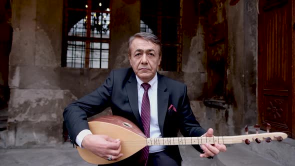 Turkish Instrument Being Played alt