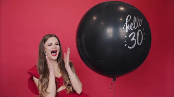 Stunning Lady in Red with Air Balloon Says Hello 30