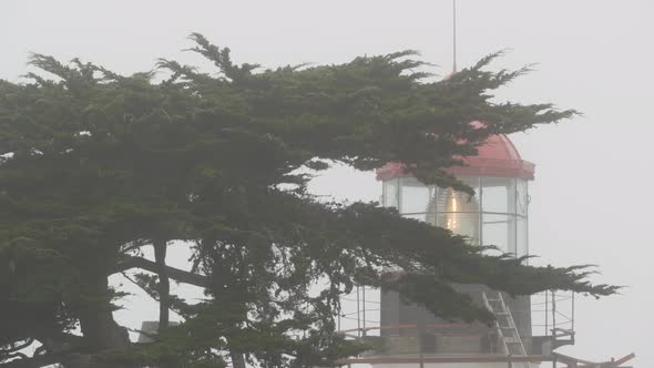 Old Lighthouse Fresnel Lens Glowing Foggy Rainy Weather