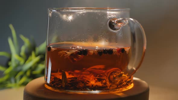 Glass Teapot Filled Hot Herbal Tea Rotates Cyclically