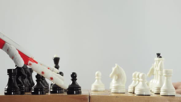 Robotic Prosthetics Hand Is Playing Chess with Human Hand. Artificial Intelligence Concept. alt