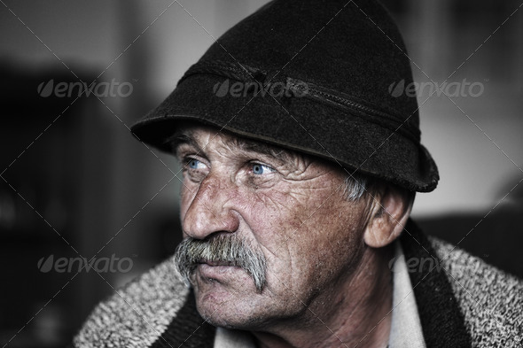 Portrait of old man with mustache, grain added - Stock Photo - Images
