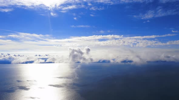 Flight through the moving cloudscape. Texture of clouds. Panoramic view. Clouds in motion	