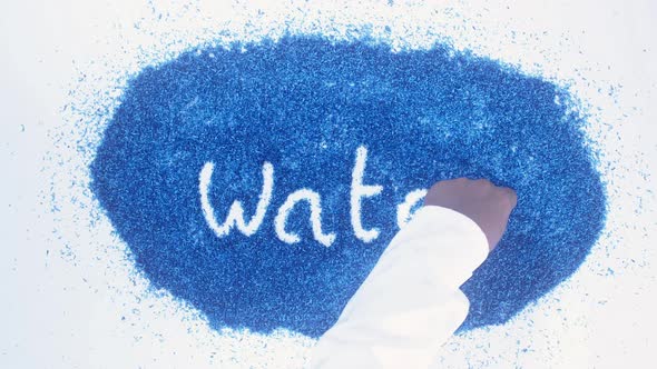 South Asian Hand Writes On Blue Water