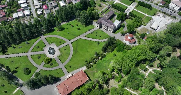 Zugdidi, Georgia - May 30 2022: Aerial view of Dadiani Palace in the center of Zugdidi city alt