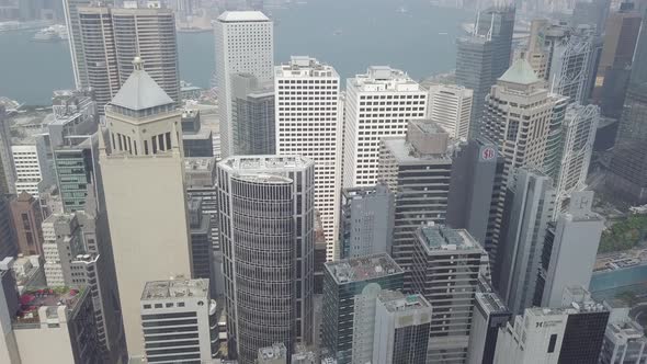 Aerial view Hong Kong cityscape skyscrapers office glass buildings Victoria harbour Concrete jungle