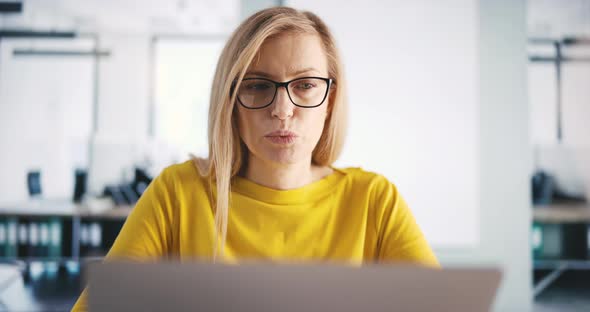 Woman Having Video Call at Workplace
