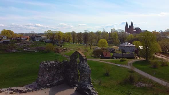 Old Stone Ruins of an Ancient Castle in Rezekne, Latvia. Aerial 4K Dron Shot alt