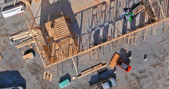 Fragment of a New Home Under Construction Wood Framing Beams alt