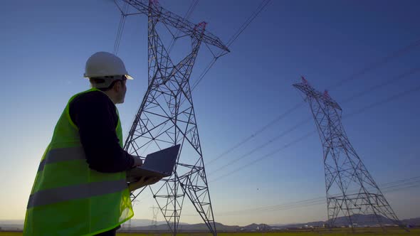 Electrical Towers and working engineer., Stock Footage | VideoHive