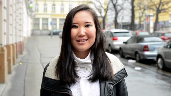Young Attractive Asian Woman Agree - Urban Street with Cars - City alt