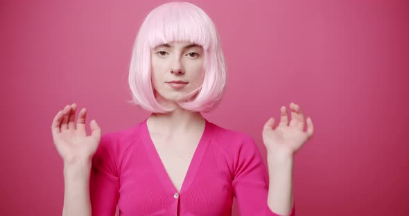 Beauty Woman with Beautiful Eyes Pink White Hair and Pink Clothes Arranges Hair alt