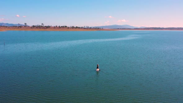 Aerial view of Stand Up Paddle Boarding on Lake Wivenhoe. alt