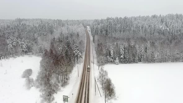 Beautiful Aerial Shot of a Slippery Road and the Landscape Around It