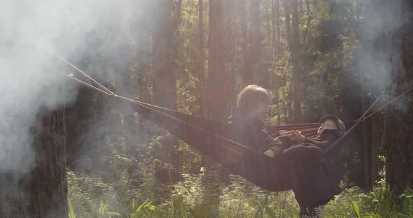Young Mother Spending Leisure Time with Son Outdoors Having Fun Together on Fresh Forest Air alt
