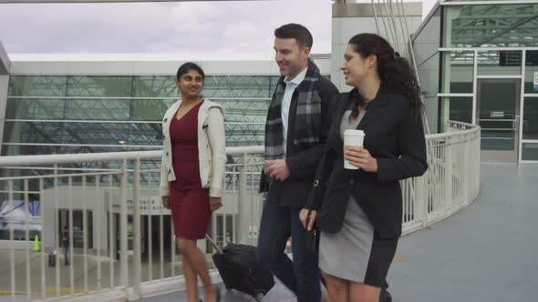 Business people walking at airport