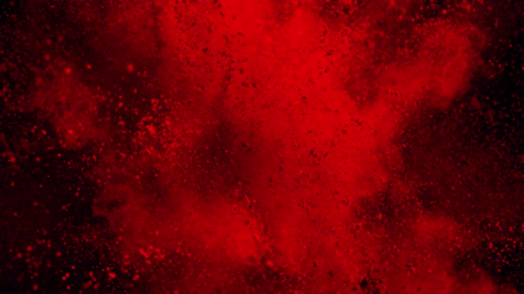 Super Slow Motion Shot of Red Powder Explosion Isolated on Black Background at 1000Fps alt