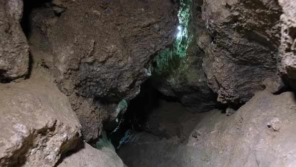 Exploring the Cave at Night alt