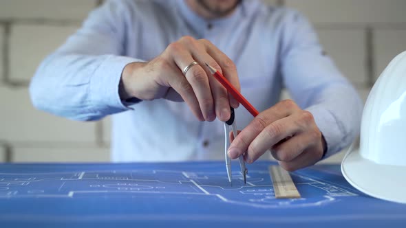 Architect Man Working With Blueprints Sketching alt