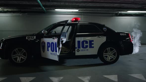 Police Car Parking at Construction Building alt