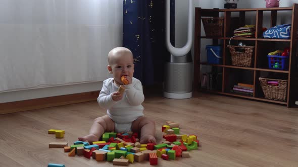 Happy Newborn Baby In Playing Room