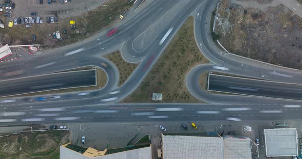 Aerial top View time lapse of busy freeway, rush hour heavy traffic jam highway. alt