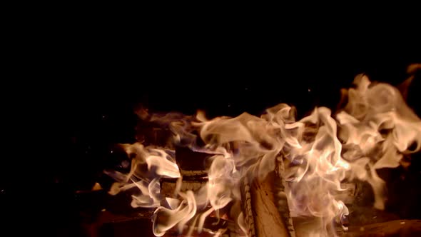 Closeup Super Slow Motion of Fire Line Isolated on Black Background