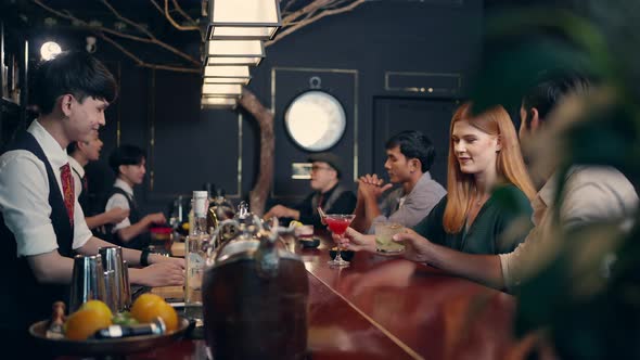 4k Group Of People Enjoy Hangout Nightlife At Luxury Bar Stock Footage