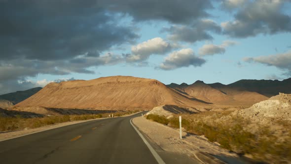 Road Trip Driving Auto From Death Valley to Las Vegas Nevada USA