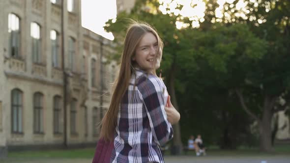 Young Woman Walking at The Park