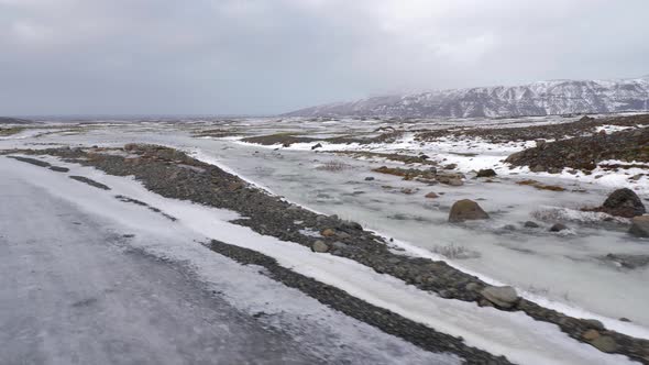 Iceland Winter View of Snow Covered Lands and Natural Sulfur Pools  alt