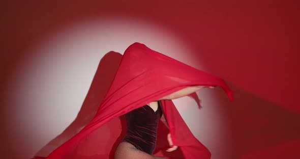 Curly Haired Woman in Bodysuit Dance in Projector Lights alt