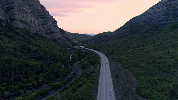 Aerial view of road through Provo Canyon with traffic alt