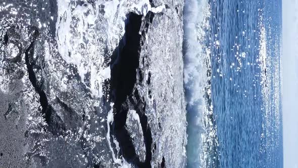 Vertical Video Sea Near the Coast  Closeup of the Coastal Seascape alt