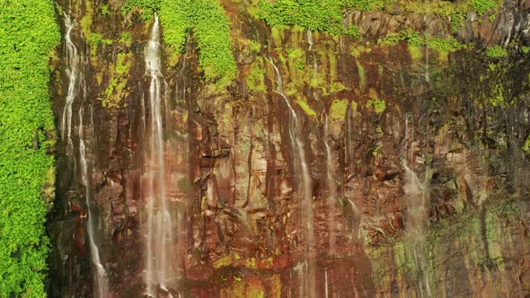 The Water Plunging Down on the Beautiful Cliffs alt