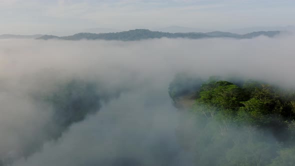 Aerial Drone View of Rainforest River Landscape with Costa Rica Mountains, Beautiful Misty Tropical alt