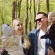 Happy Mom Dad With Small Children In His Arms In The Park. A Walk In Nature - VideoHive Item for Sale