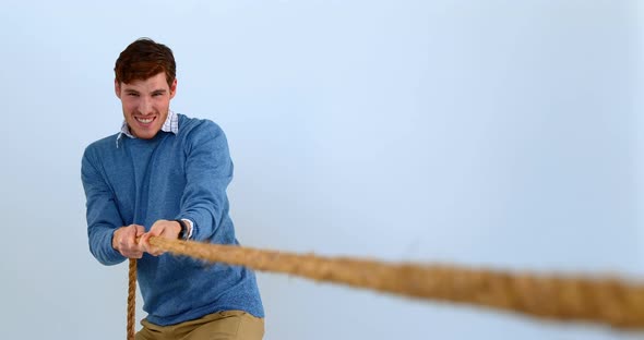 Man pulling a rope tug of war  alt